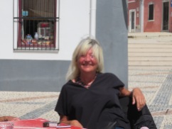 The ever smiling Susie enjoying a relaxing time on the patio...........we love seeing her here.