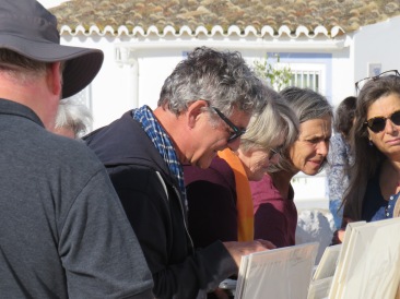 Marc checking out a fellow artist from the Algarve Artists Community, of which he is a member.
